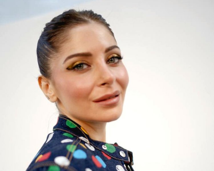 Kanika Kapoor Radiates Elegance in Louis Vuitton's Blue Polka-Dotted Ensemble at Paris Fashion Week